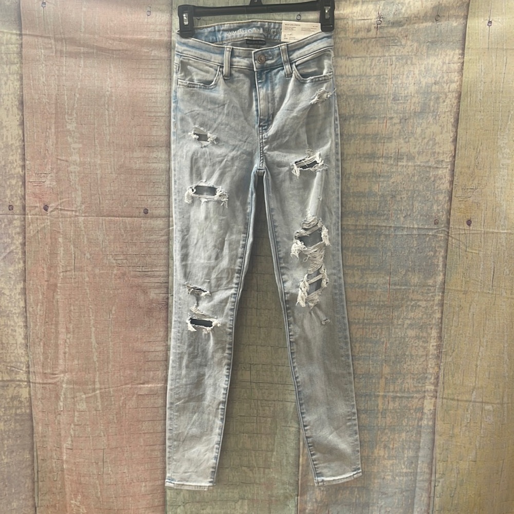 New with tags Woman’s American Eagle super hi-rise Jean jeggings. Size 0. 25W.